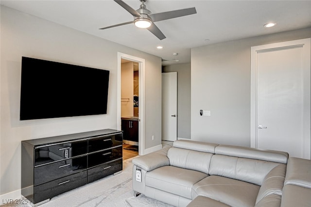 living room featuring carpet floors, visible vents, and baseboards