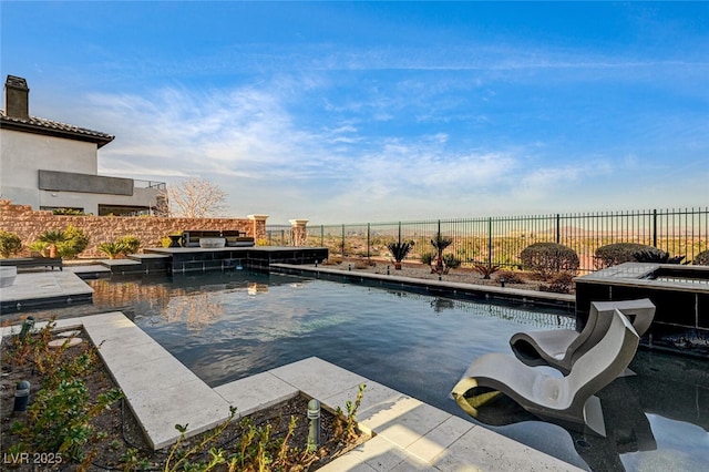 view of swimming pool with a fenced backyard and a fenced in pool