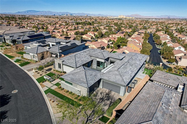 birds eye view of property featuring a residential view and a mountain view