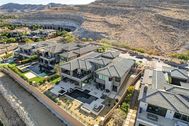 bird's eye view with a mountain view and a residential view