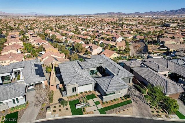 birds eye view of property featuring a residential view and a mountain view