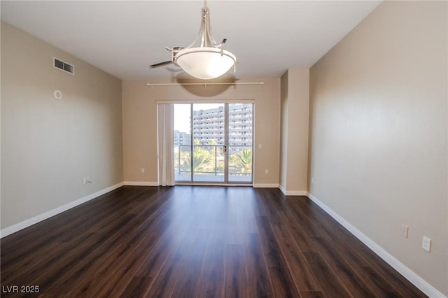 8255 Las Vegas Blvd Unit 415, Las Vegas, NV 89123 - empty room featuring dark wood-type flooring and baseboards