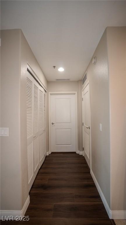 8255 Las Vegas Blvd Unit 415, Las Vegas, NV 89123 - corridor featuring dark wood-style floors and recessed lighting