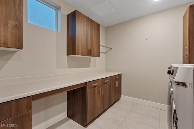 kitchen featuring open shelves, light tile patterned floors, light countertops, modern cabinets, and baseboards