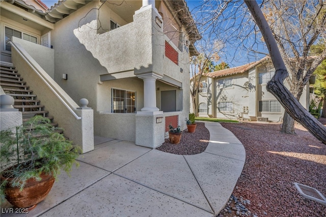 exterior space with stucco siding