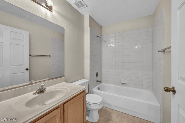 full bath with toilet, visible vents, tub / shower combination, and vanity