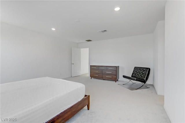 bedroom with light colored carpet, visible vents, and recessed lighting