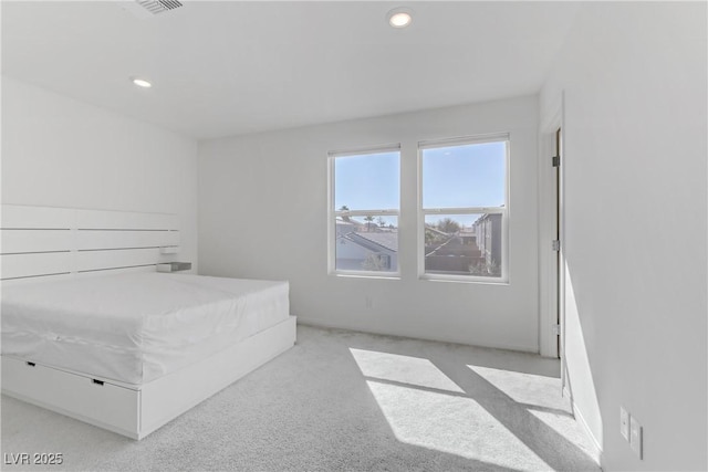 bedroom featuring visible vents and recessed lighting