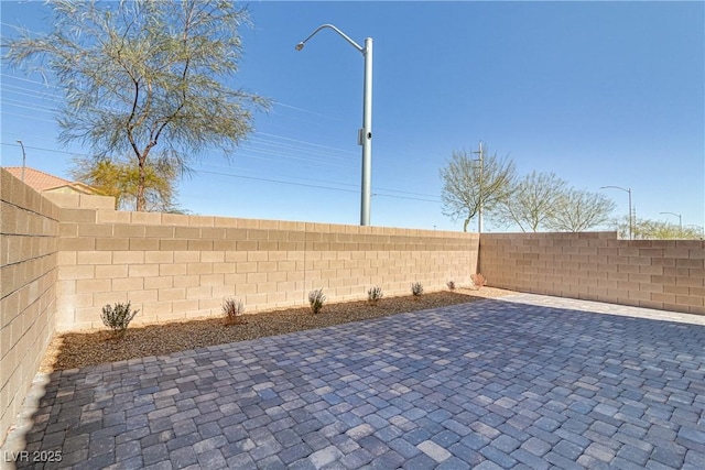 view of patio with a fenced backyard