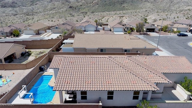 birds eye view of property with a residential view