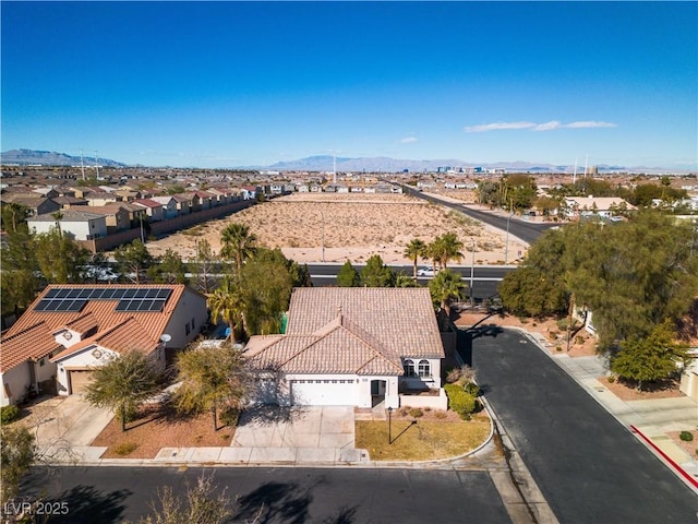 aerial view with a mountain view and a residential view