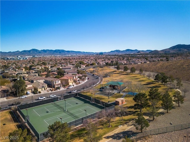 drone / aerial view with a residential view and a mountain view