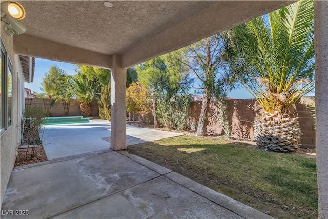 view of patio featuring a fenced backyard