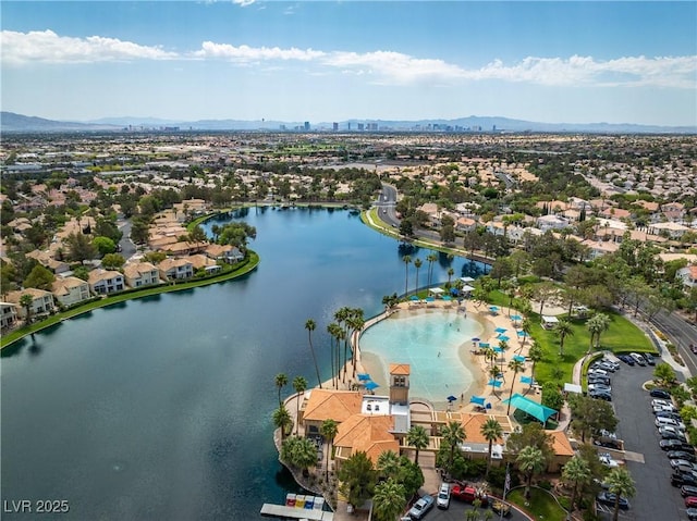 birds eye view of property featuring a residential view and a water and mountain view