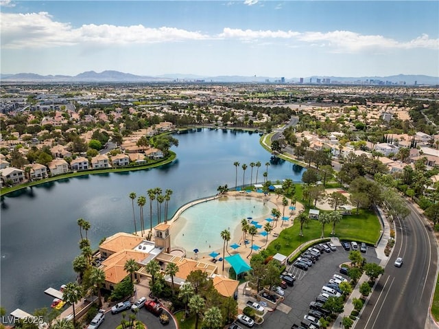 bird's eye view featuring a residential view and a water and mountain view