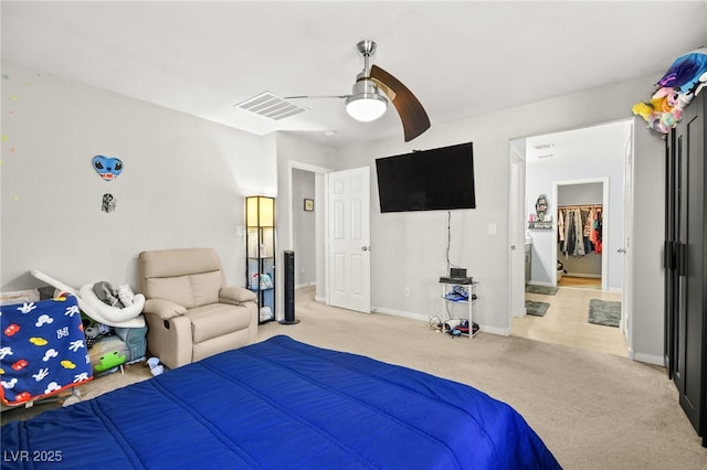 bedroom with light carpet, baseboards, visible vents, and ceiling fan