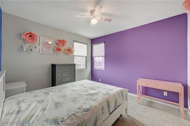 bedroom with carpet floors, baseboards, and a ceiling fan