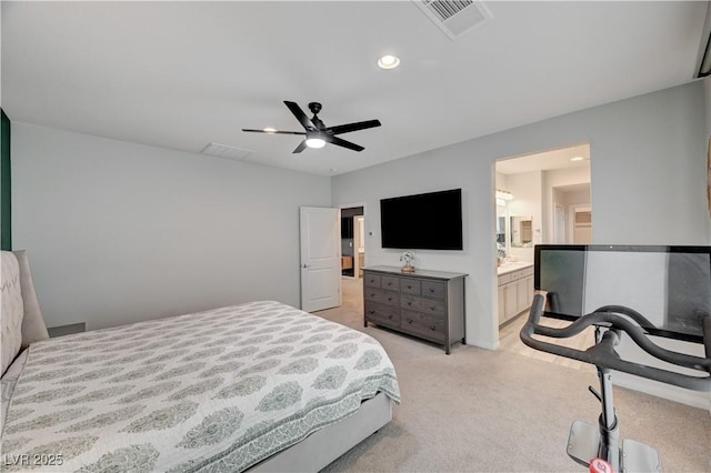 bedroom featuring recessed lighting, light colored carpet, visible vents, connected bathroom, and ceiling fan