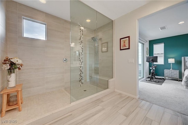 ensuite bathroom with plenty of natural light, ensuite bath, and walk in shower