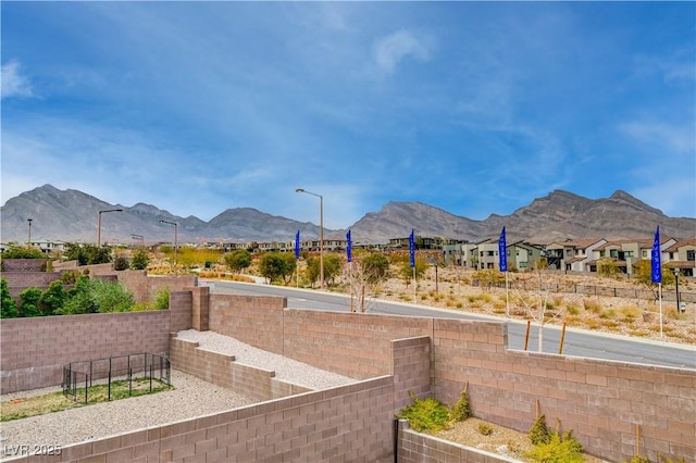 property view of mountains featuring a residential view