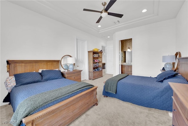 bedroom with recessed lighting, a raised ceiling, visible vents, light carpet, and ceiling fan