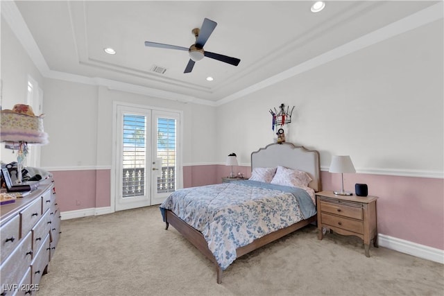 bedroom with access to exterior, a raised ceiling, visible vents, ornamental molding, and light carpet