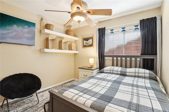 bedroom featuring a ceiling fan and baseboards