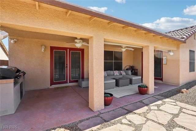 view of patio / terrace with ceiling fan, a grill, and an outdoor hangout area