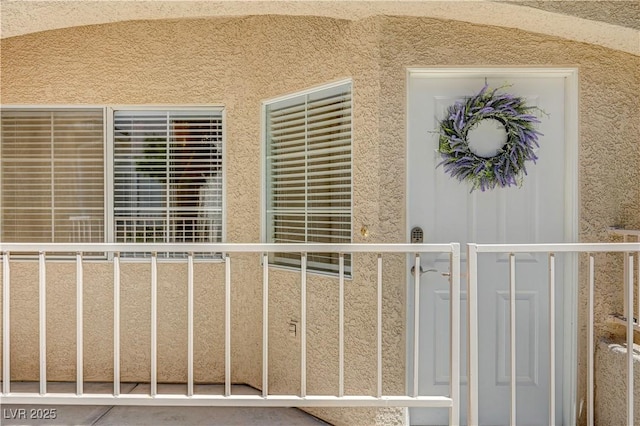 exterior space featuring stucco siding