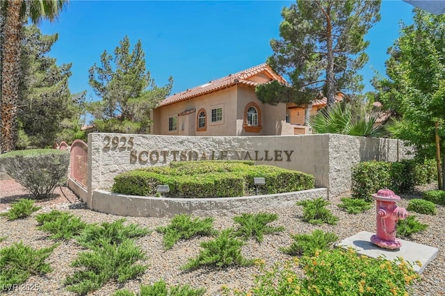 view of community sign