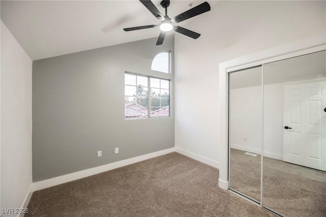 unfurnished bedroom featuring ceiling fan, a closet, baseboards, and carpet flooring