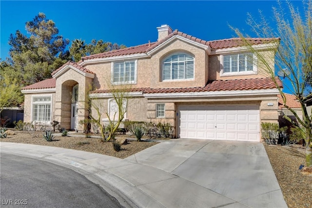 mediterranean / spanish-style home featuring a garage, a chimney, a tile roof, and stucco siding