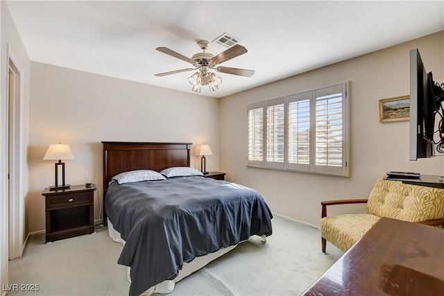 7624 Nocturne Ct, Las Vegas, NV 89128 - bedroom with light carpet, baseboards, and a ceiling fan