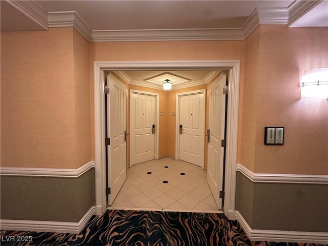 interior space with ornamental molding and light tile patterned flooring