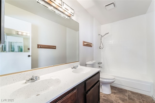 2667 Aracatuba Ave, Las Vegas, NV 89121 - full bathroom with visible vents, a sink, double vanity, and toilet