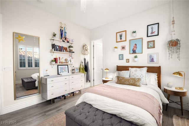 bedroom featuring wood finished floors