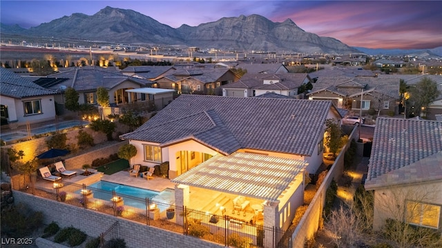 birds eye view of property featuring a residential view and a mountain view