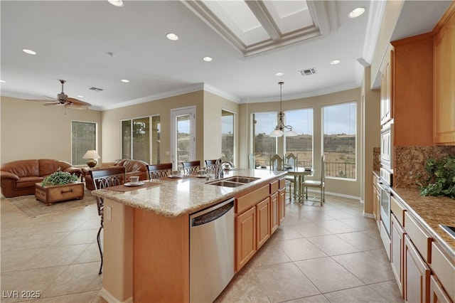 kitchen featuring a sink, stainless steel appliances, ornamental molding, and light tile patterned flooring