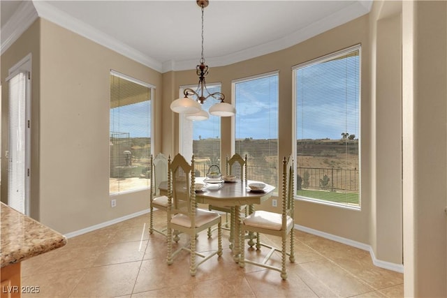 dining area with crown molding, a notable chandelier, baseboards, and plenty of natural light