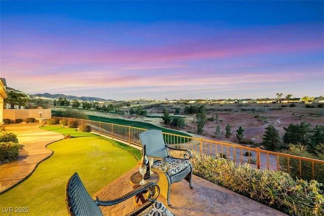 view of patio featuring fence