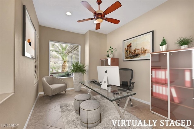 tiled home office with baseboards and ceiling fan