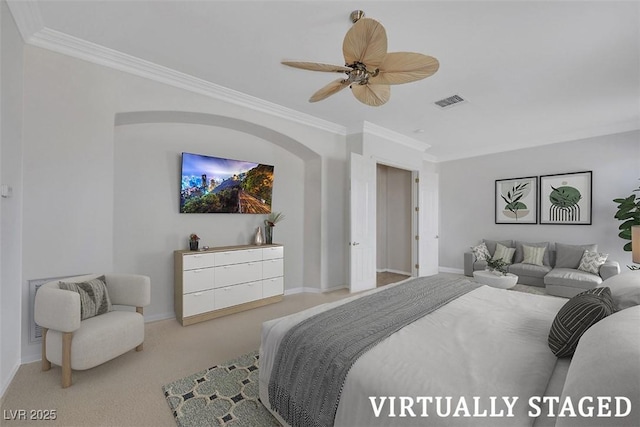 carpeted bedroom featuring a ceiling fan, crown molding, baseboards, and visible vents