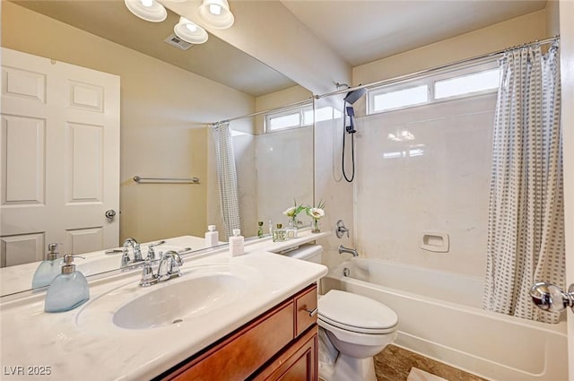 bathroom with shower / bath combo, toilet, and vanity
