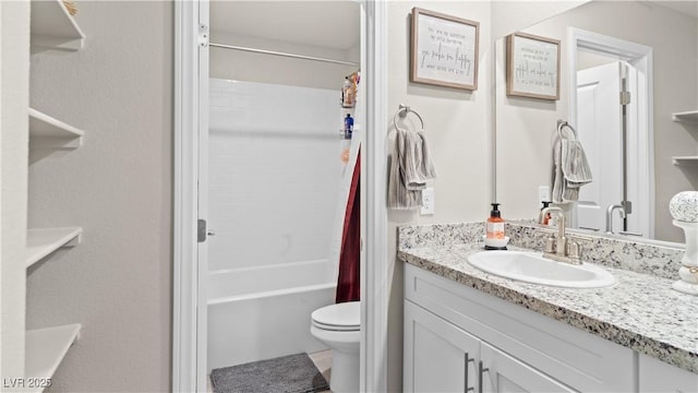 full bathroom featuring toilet, shower / tub combo with curtain, and vanity