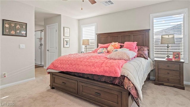 bedroom featuring light colored carpet, visible vents, ceiling fan, and baseboards