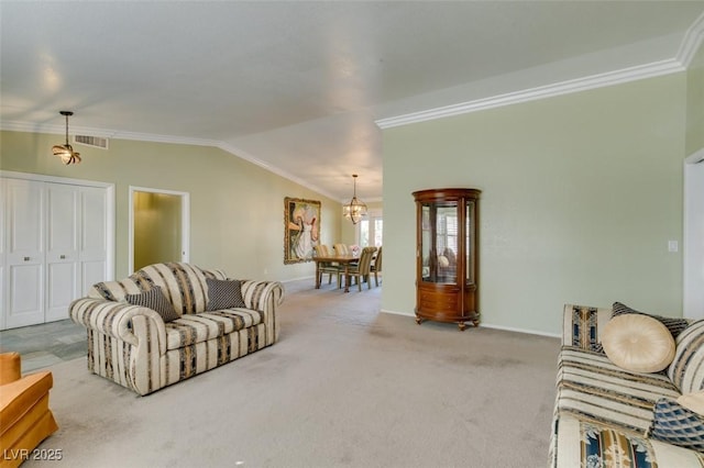 living room with visible vents, an inviting chandelier, vaulted ceiling, crown molding, and carpet floors