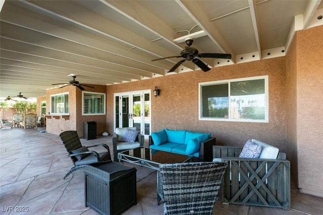 view of patio featuring an outdoor hangout area, ceiling fan, and french doors