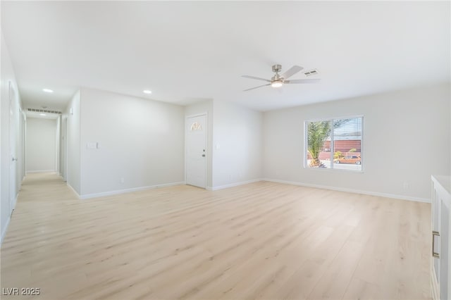 unfurnished room with visible vents, baseboards, a ceiling fan, light wood-style flooring, and recessed lighting