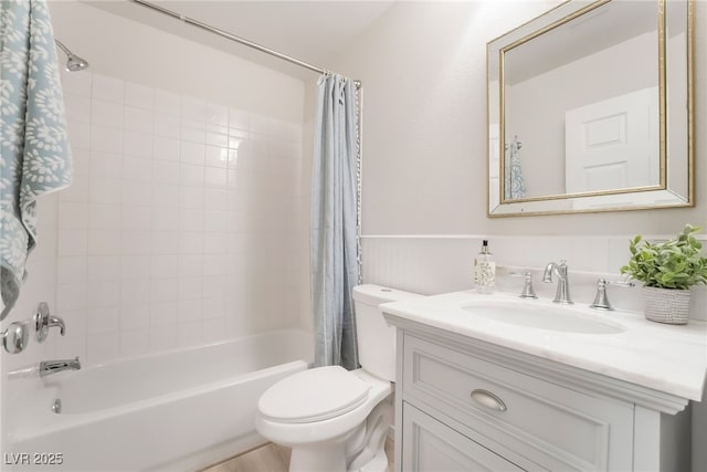 full bathroom with toilet, shower / bathtub combination with curtain, and vanity