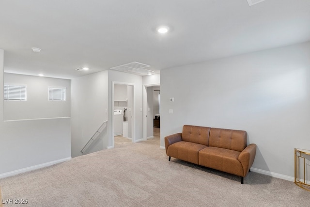 sitting room featuring light carpet, visible vents, baseboards, and recessed lighting